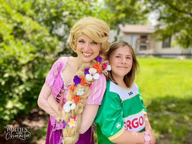 Rapunzel hugging a young girl wearing a green soccer jersey outdoors