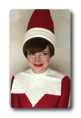 Elf on the Shelf character in red and green elf costume